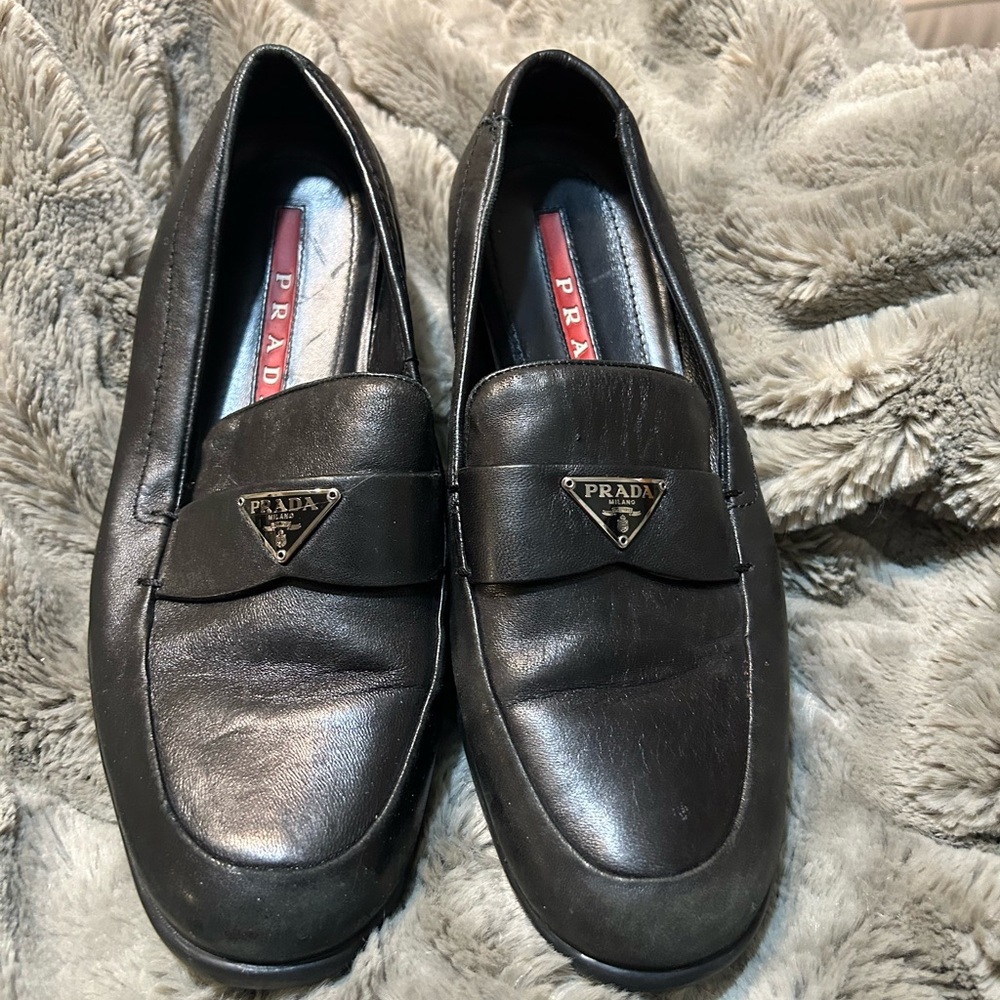 Prada Women's Dark Leather Slip-Ons